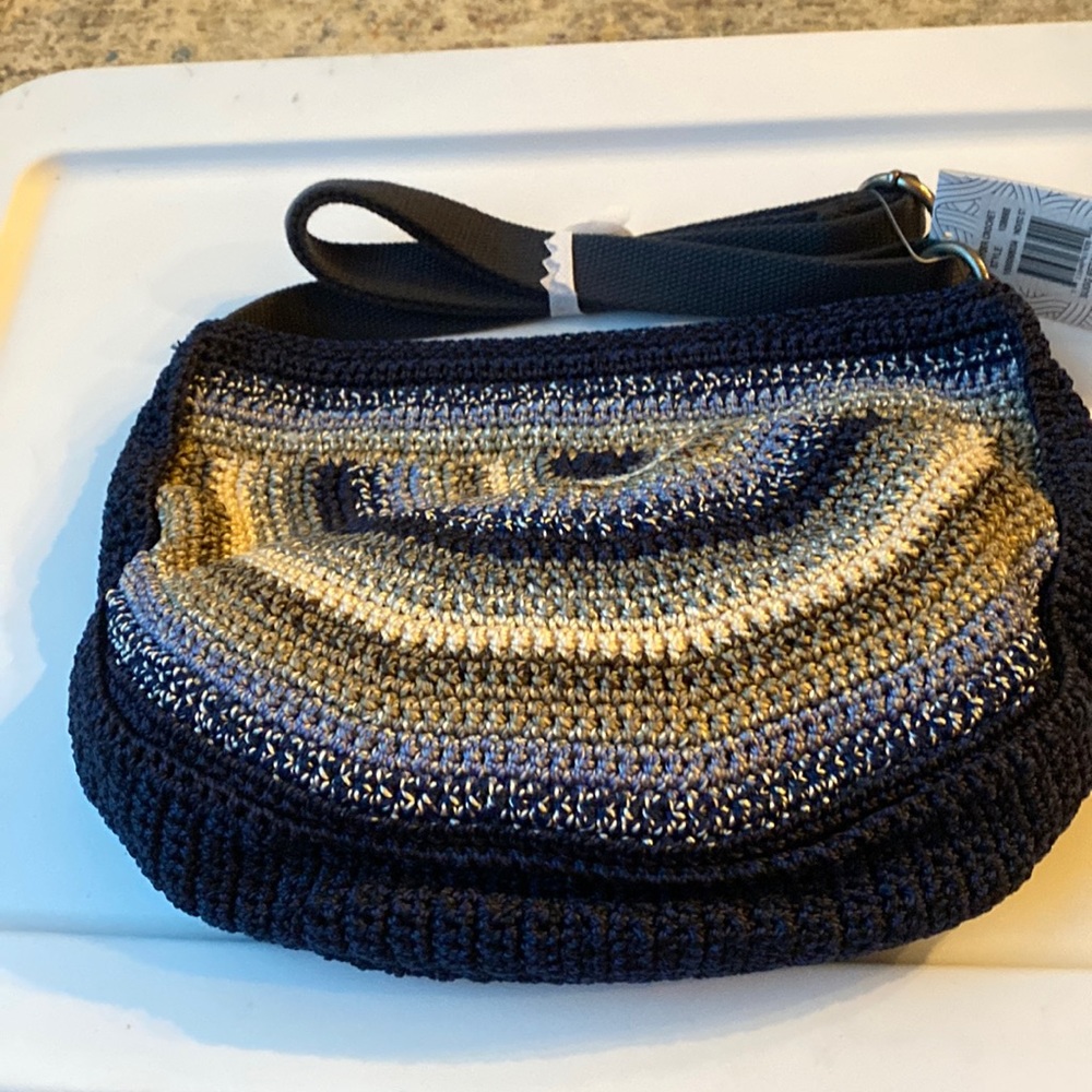 Blues and greys for colors. The sak med size bag